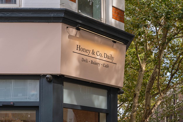 honey and co daily bakery front with signage