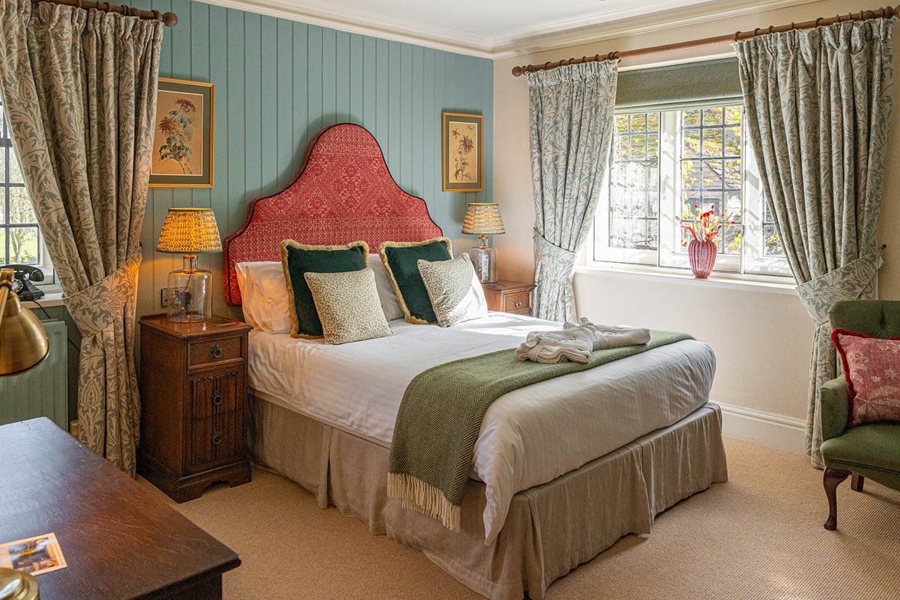 before and after bedroom suite at the stone house hotel