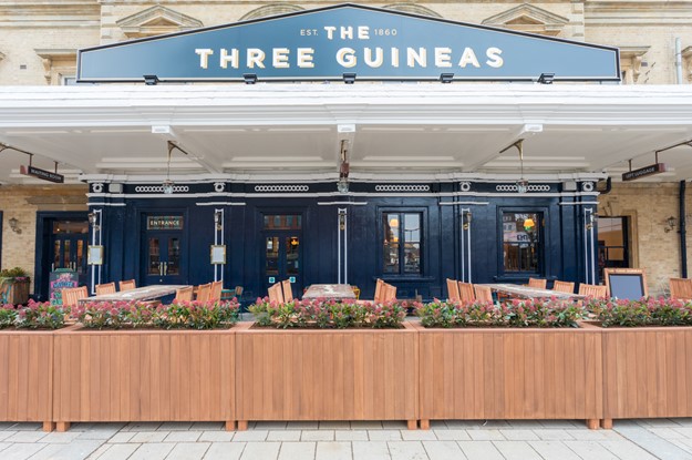 Outdoor seating at The Three Guineas