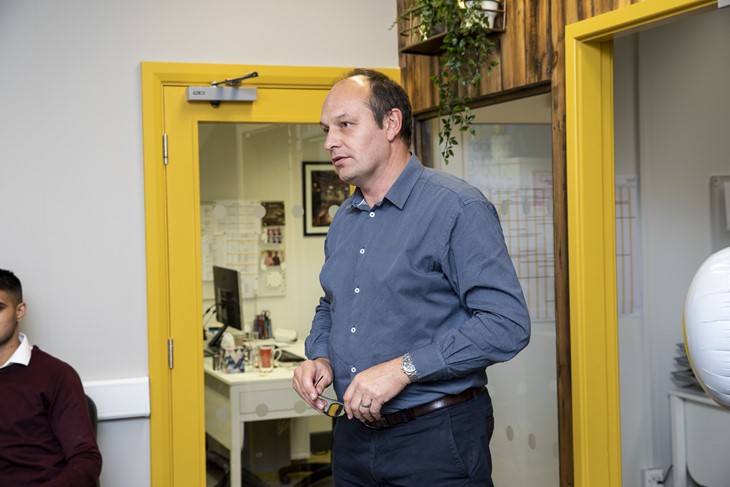 director delivering a speech