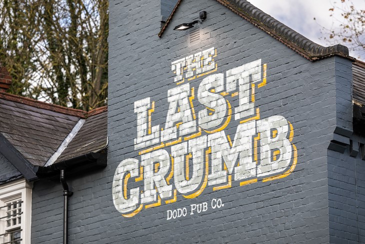 pub sign writing at the last crumb