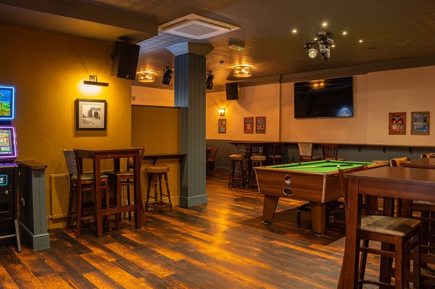 The Lowther pub seating with pool table