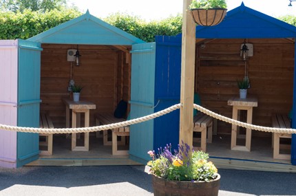Garden seating sheds in beer garden