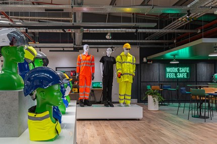 Lyreco showroom with mannequins and safety helmets 