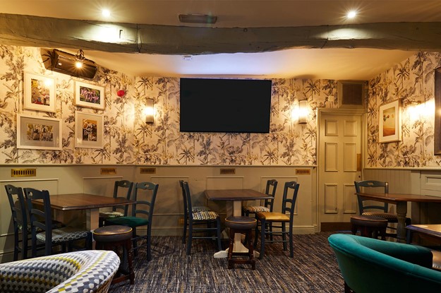 TV in a pub with seating