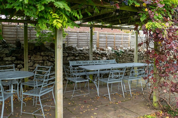 metal outdoor seating at a pub