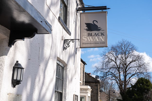 Black swan pub exterior signage